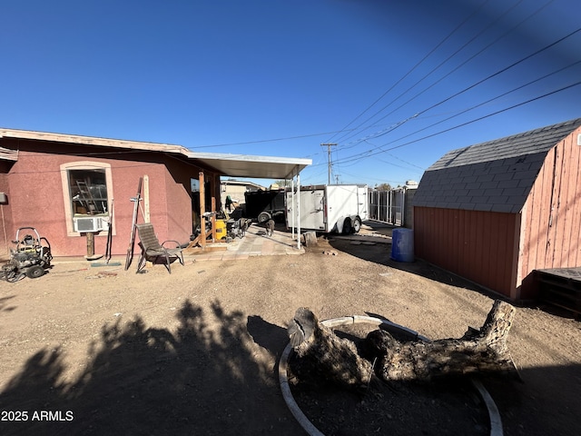 exterior space with a storage shed