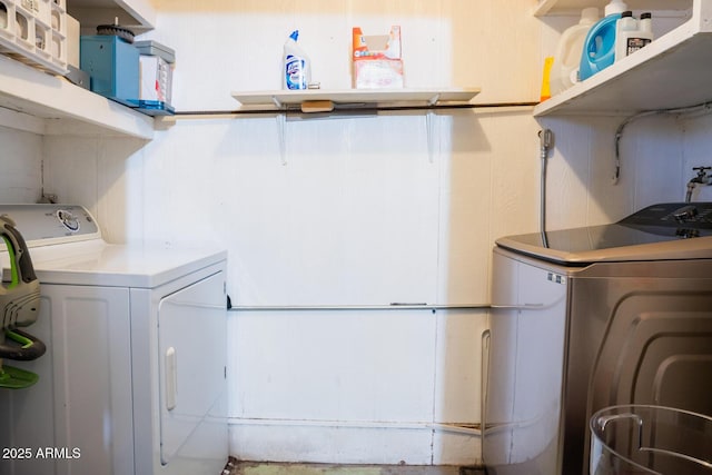 laundry room with washer and dryer