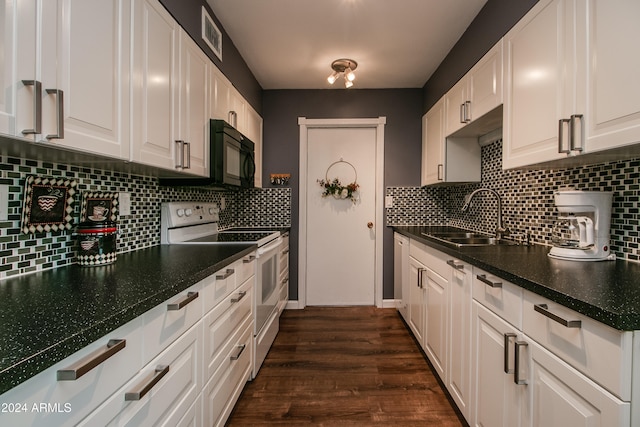 kitchen featuring stainless steel electric range oven, sink, dark hardwood / wood-style floors, decorative backsplash, and white cabinets