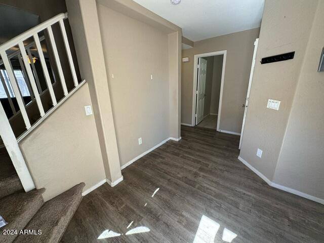 interior space featuring dark wood-type flooring