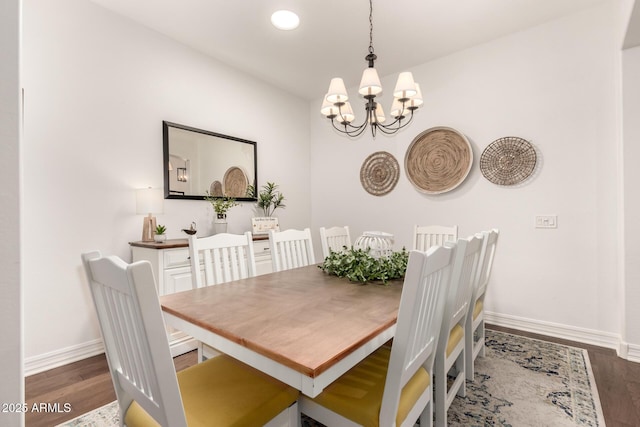 2879 E Austin Dr, Gilbert, AZ 85296 - dining area featuring a chandelier, baseboards, and wood finished floors