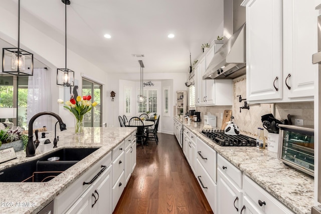 2879 E Austin Dr, Gilbert, AZ 85296 - kitchen with a sink, exhaust hood, gas cooktop, white cabinetry, and dark wood-style floors