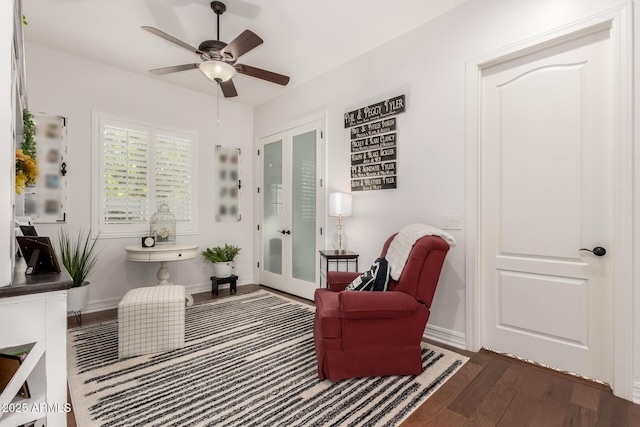 2879 E Austin Dr, Gilbert, AZ 85296 - living area featuring wood finished floors, french doors, a ceiling fan, and baseboards