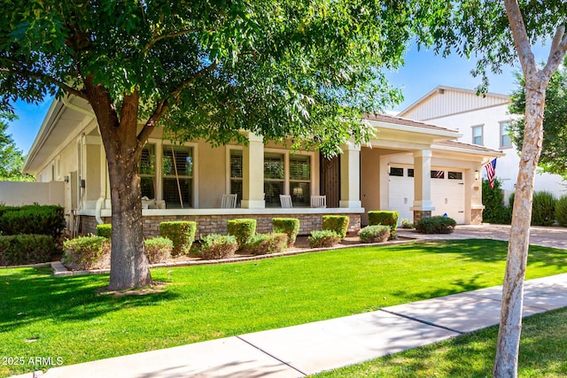 2879 E Austin Dr, Gilbert, AZ 85296 - view of front of home featuring driveway, a porch, a garage, stucco siding, and a front lawn