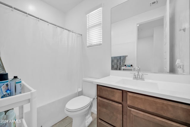 full bathroom with tile patterned floors, vanity, toilet, and shower / tub combo with curtain