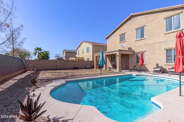 view of pool with a patio area