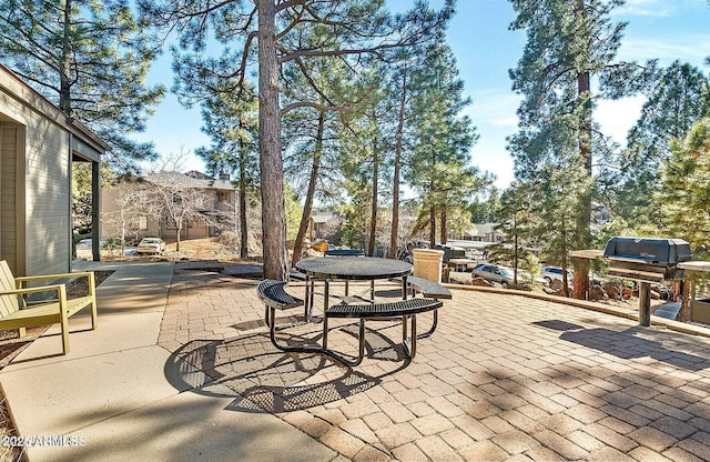 1185 W University Ave Unit 228, Flagstaff, AZ 86001 - view of patio / terrace with outdoor dining area and a grill