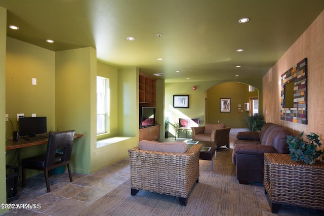 1185 W University Ave Unit 228, Flagstaff, AZ 86001 - living area featuring arched walkways, recessed lighting, and an office area
