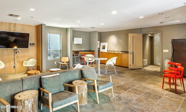 1185 W University Ave Unit 228, Flagstaff, AZ 86001 - living area with recessed lighting and light stone finish floors