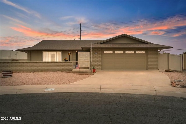 ranch-style home with a garage