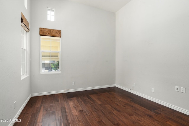 8240 E Wingspan Way, Scottsdale, AZ 85255 - unfurnished room with dark wood-style flooring and baseboards
