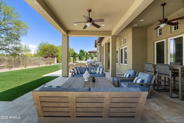 8240 E Wingspan Way, Scottsdale, AZ 85255 - view of patio with outdoor dining area, ceiling fan, and outdoor lounge area