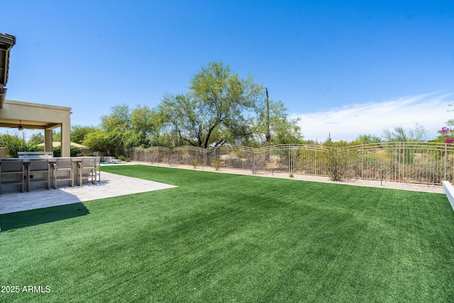 8240 E Wingspan Way, Scottsdale, AZ 85255 - view of yard featuring a patio area
