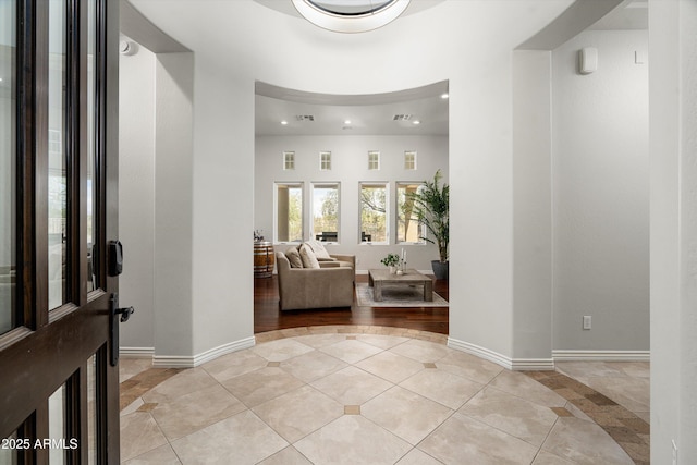 8240 E Wingspan Way, Scottsdale, AZ 85255 - foyer entrance with light tile patterned flooring, recessed lighting, baseboards, and a high ceiling