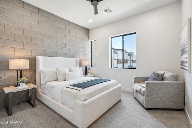 bedroom with ceiling fan and carpet flooring