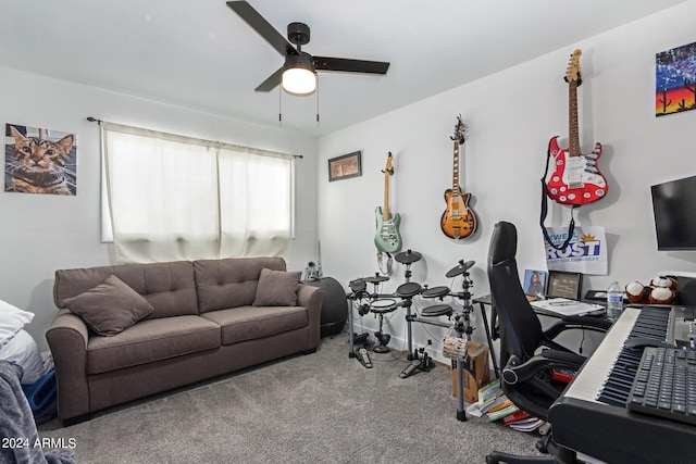 carpeted office space with ceiling fan