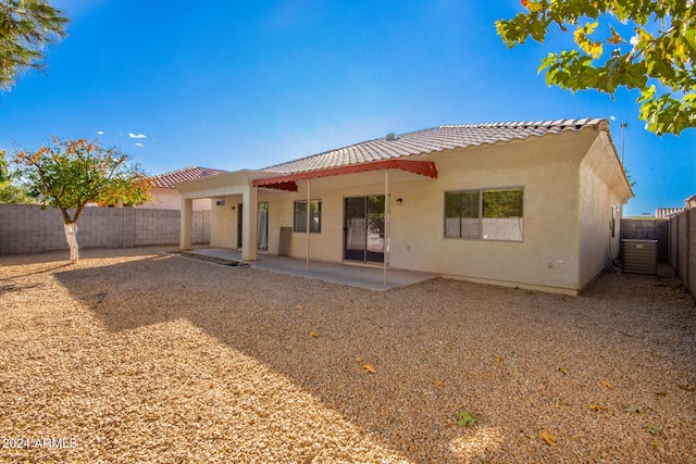 rear view of property with a patio area