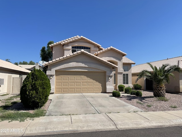 view of front of property with a garage