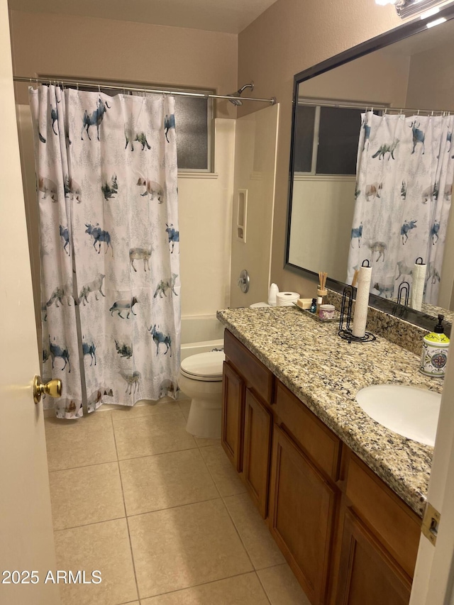 full bathroom featuring tile patterned flooring, vanity, shower / bath combo, and toilet