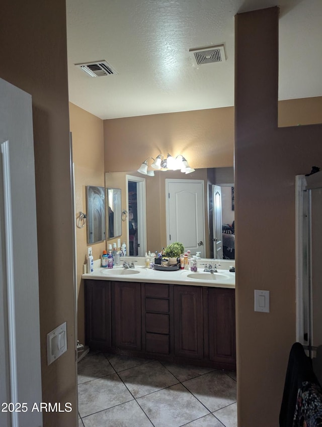 bathroom featuring vanity and tile patterned floors