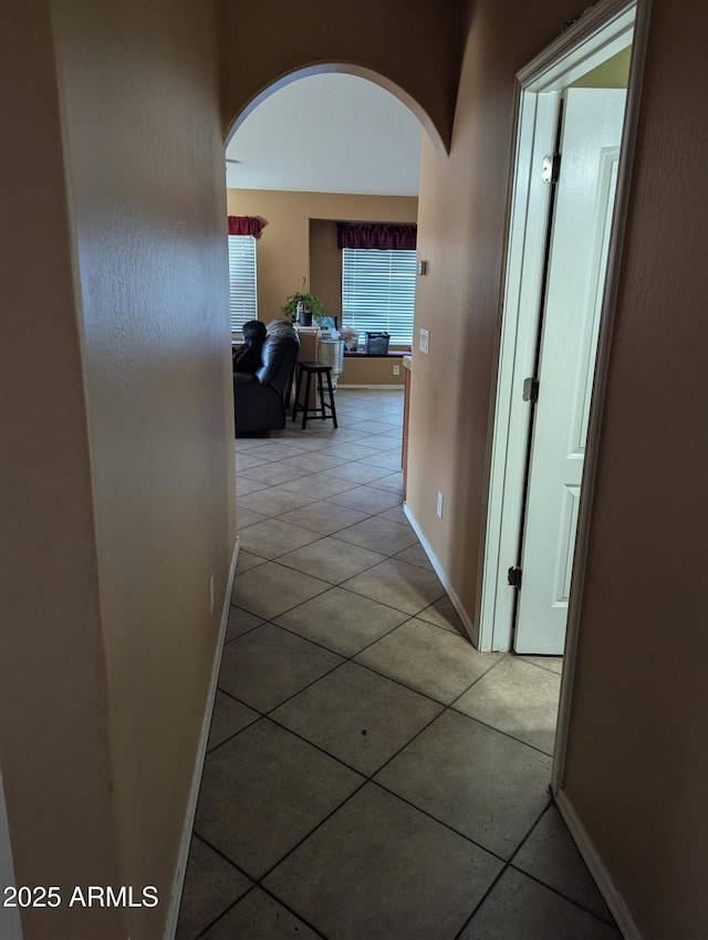 corridor featuring tile patterned floors