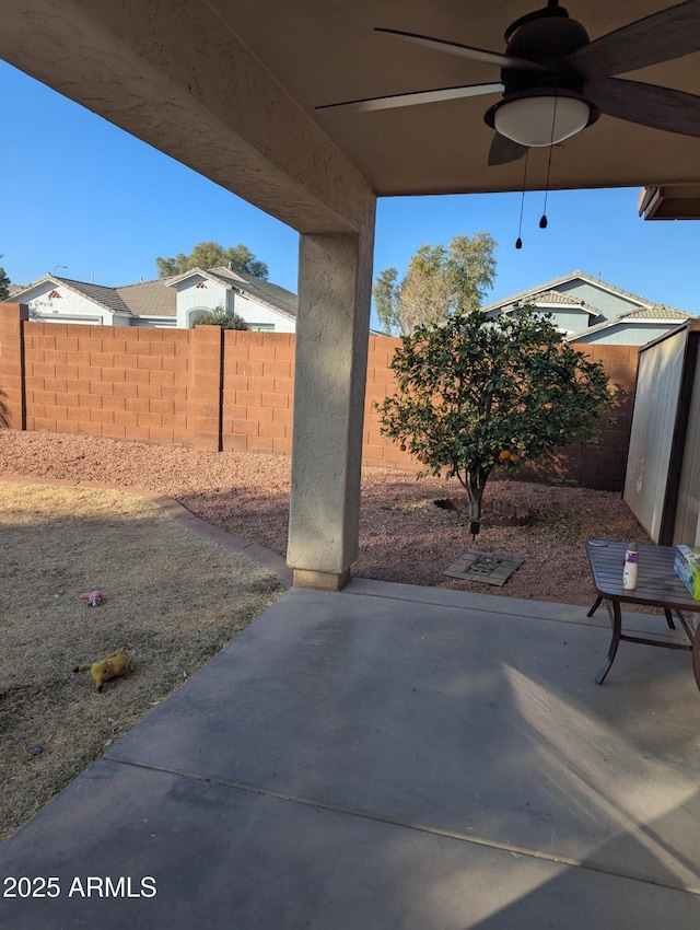 view of patio with ceiling fan