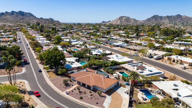 birds eye view of property featuring a residential view and a mountain view