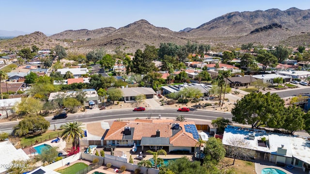 bird's eye view featuring a residential view and a mountain view