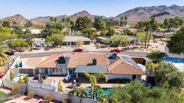 birds eye view of property with a residential view and a mountain view