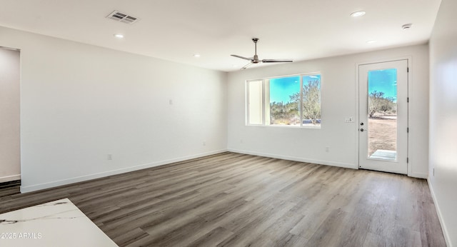16025 E Rancho Laredo Dr, Scottsdale, AZ 85262 - unfurnished living room with a ceiling fan, wood finished floors, recessed lighting, and baseboards