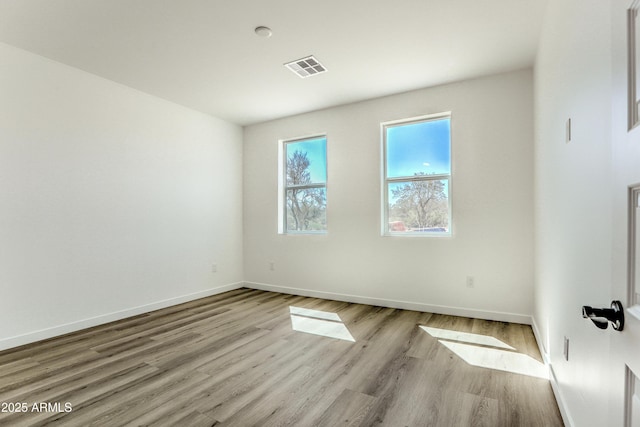 16025 E Rancho Laredo Dr, Scottsdale, AZ 85262 - unfurnished room with wood finished floors and baseboards