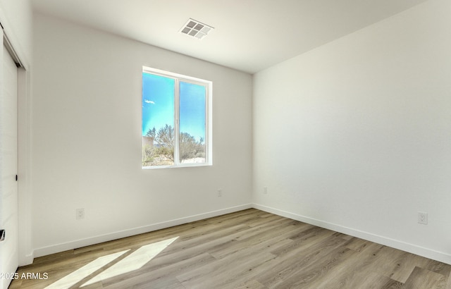 16025 E Rancho Laredo Dr, Scottsdale, AZ 85262 - unfurnished bedroom featuring light wood-style flooring, baseboards, and a closet