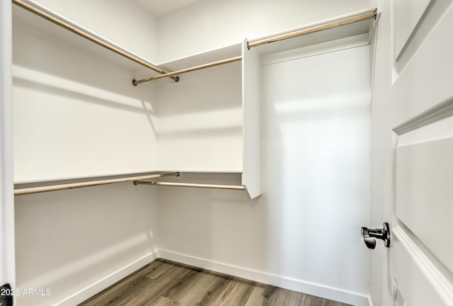 16025 E Rancho Laredo Dr, Scottsdale, AZ 85262 - walk in closet with wood finished floors