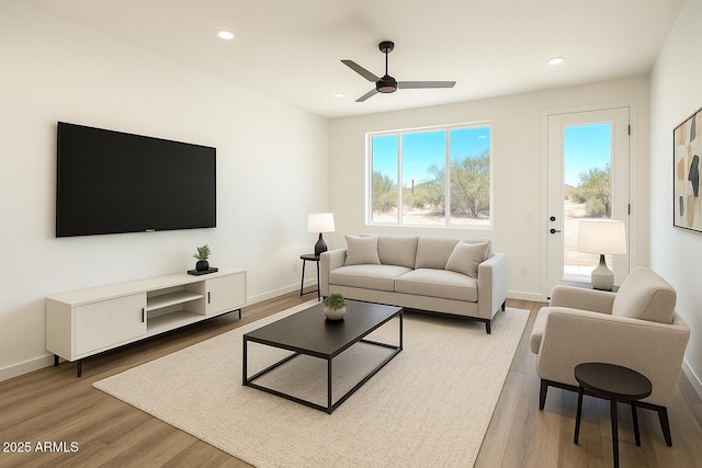 16025 E Rancho Laredo Dr, Scottsdale, AZ 85262 - living room featuring ceiling fan, light wood-type flooring, recessed lighting, and baseboards
