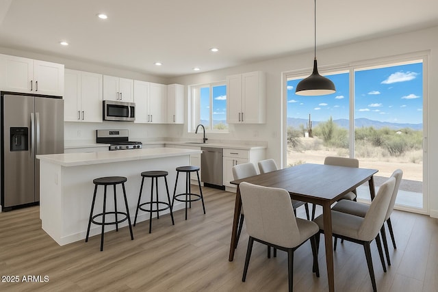 16025 E Rancho Laredo Dr, Scottsdale, AZ 85262 - dining space featuring light wood finished floors and recessed lighting