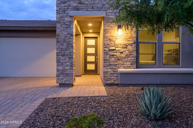 entrance to property with a garage