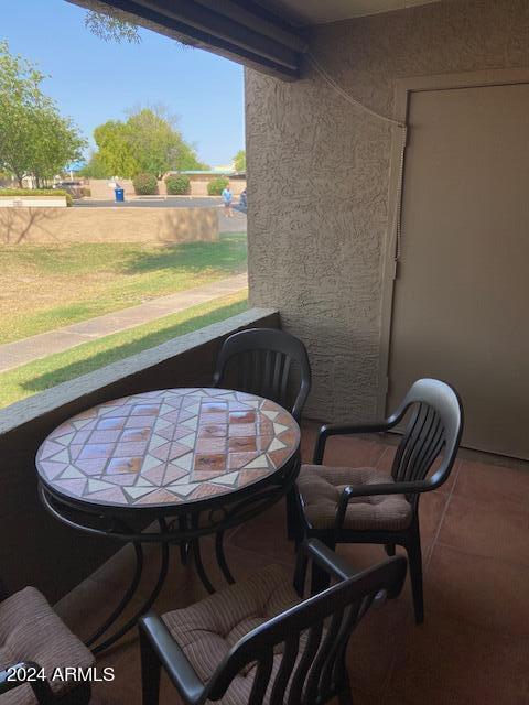 view of patio / terrace featuring a balcony