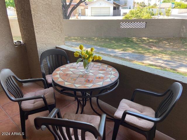 balcony with a patio area