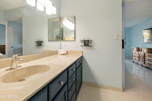 bathroom with vanity and tile patterned floors