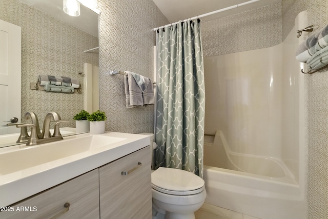 full bathroom featuring toilet, shower / tub combo, and vanity