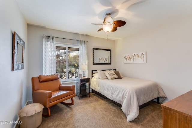 carpeted bedroom featuring a ceiling fan