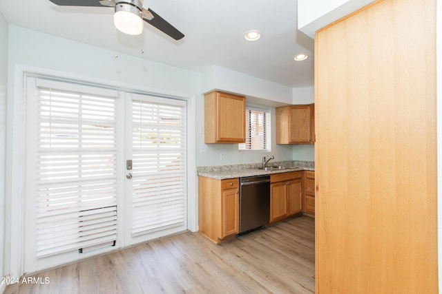 kitchen with dishwasher, light hardwood / wood-style flooring, ceiling fan, and sink