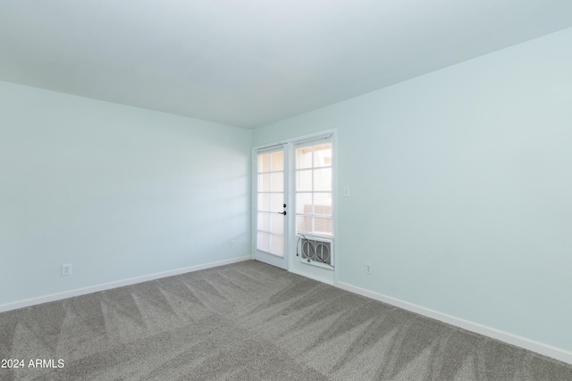 spare room with carpet floors