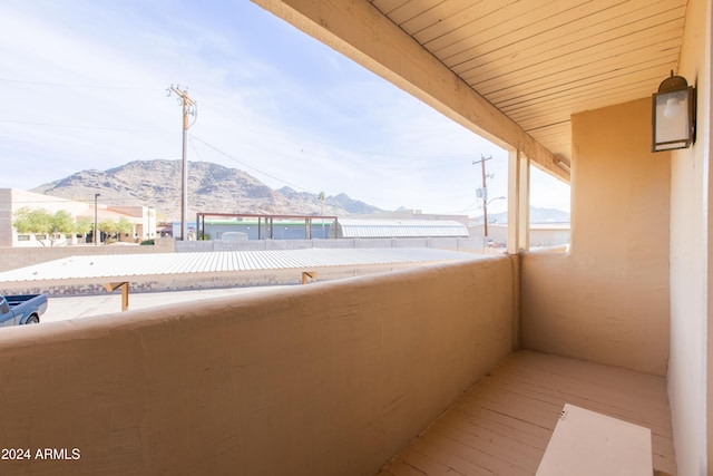 balcony featuring a mountain view