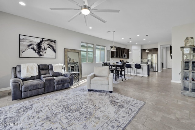 living room featuring ceiling fan