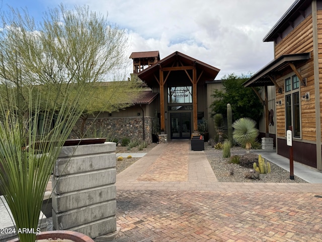 entrance to property featuring french doors