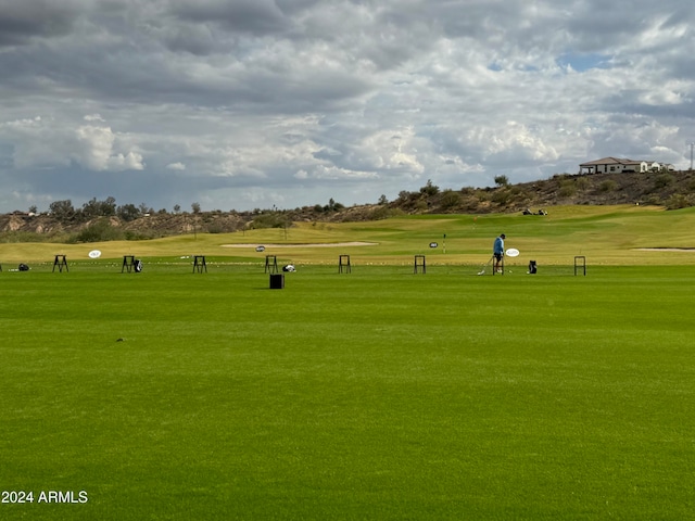 view of property's community featuring a lawn