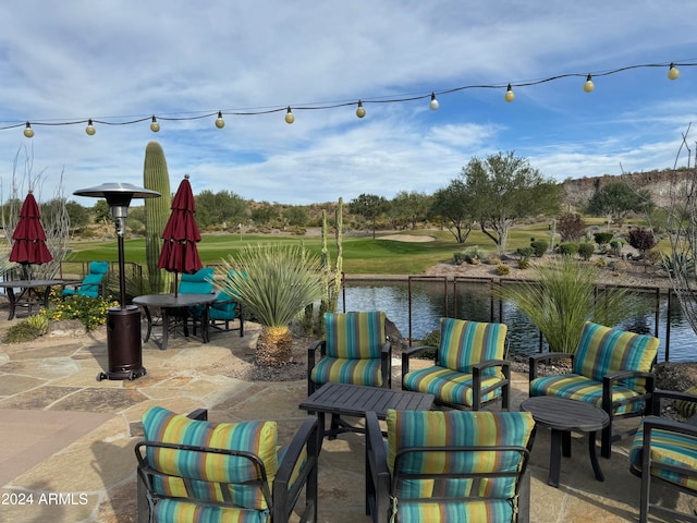 view of patio / terrace featuring a water view