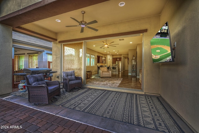 view of patio / terrace featuring ceiling fan