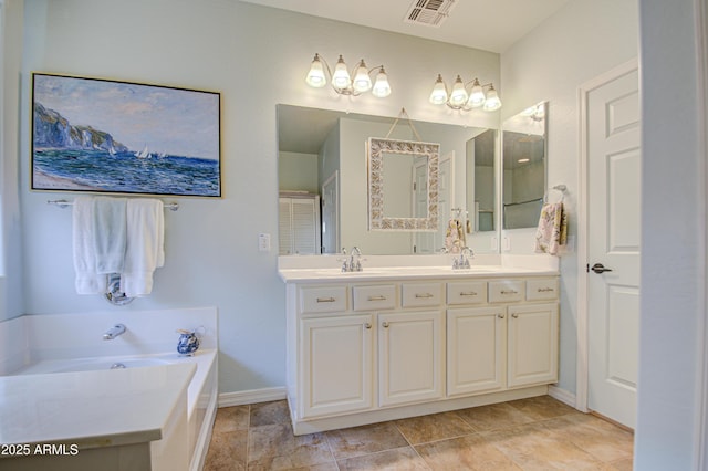 bathroom featuring visible vents, a sink, double vanity, baseboards, and a bath